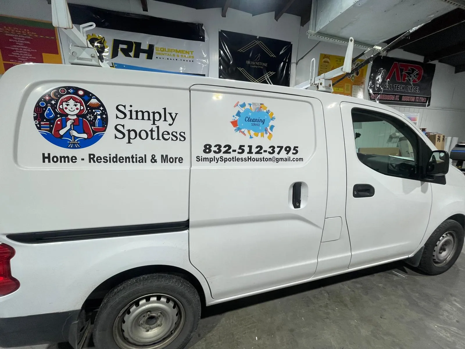 White service van with printed side graphics